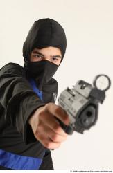 VLASTIMIL KNEELING POSE WITH GUN